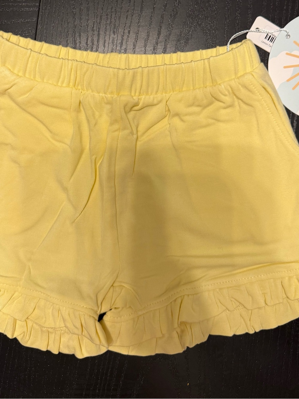 Luxe Yellow High-Waist Ruffle Hem Shorts
